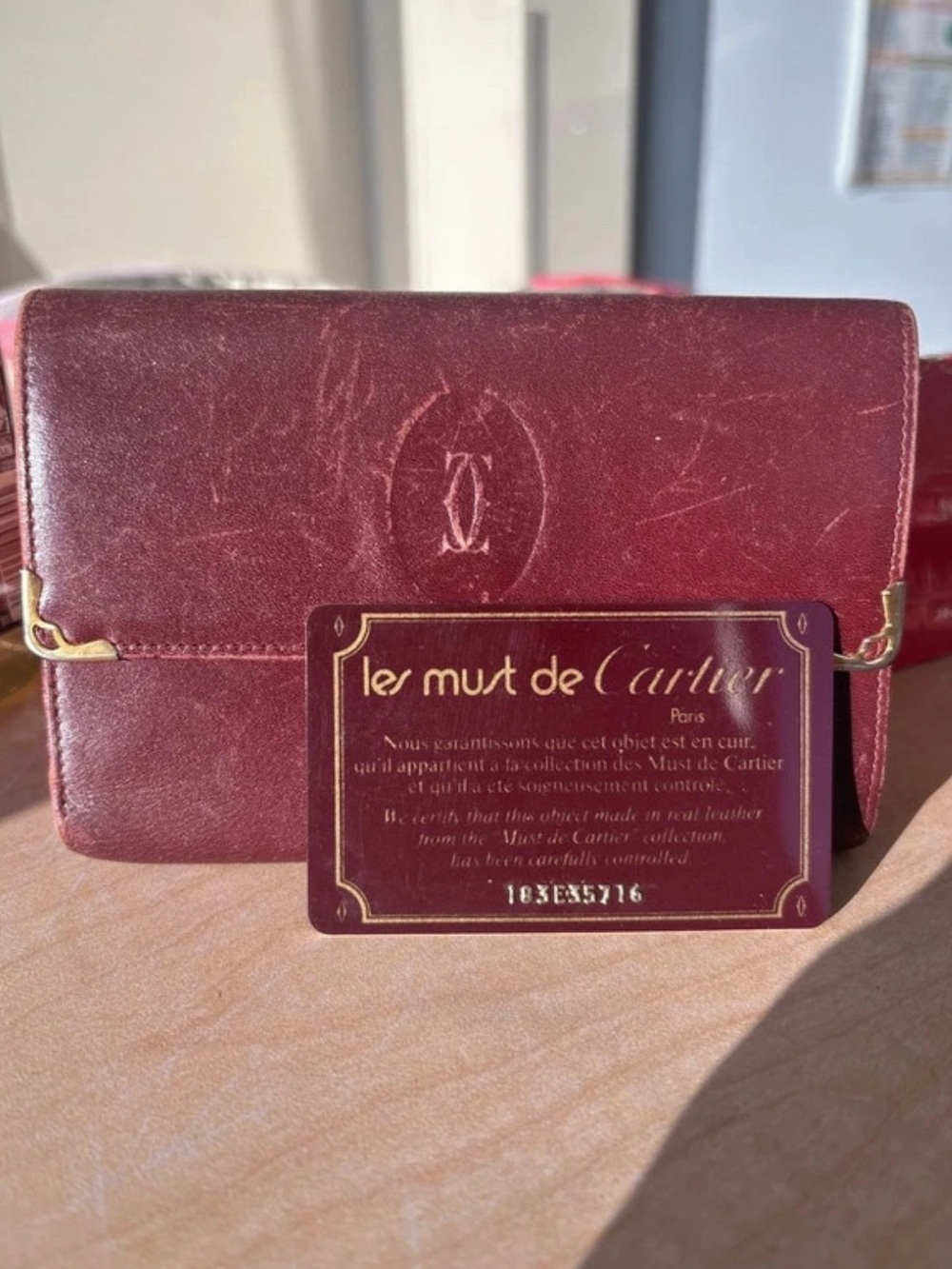 Cartier Burgundy Leather Wallet with Gold-Tone Corner Accents